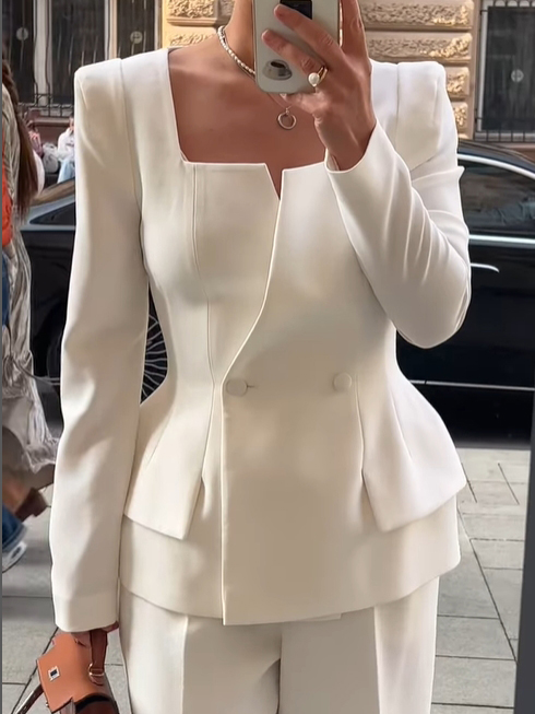 Two-button blazer with a square collar in a solid color.
