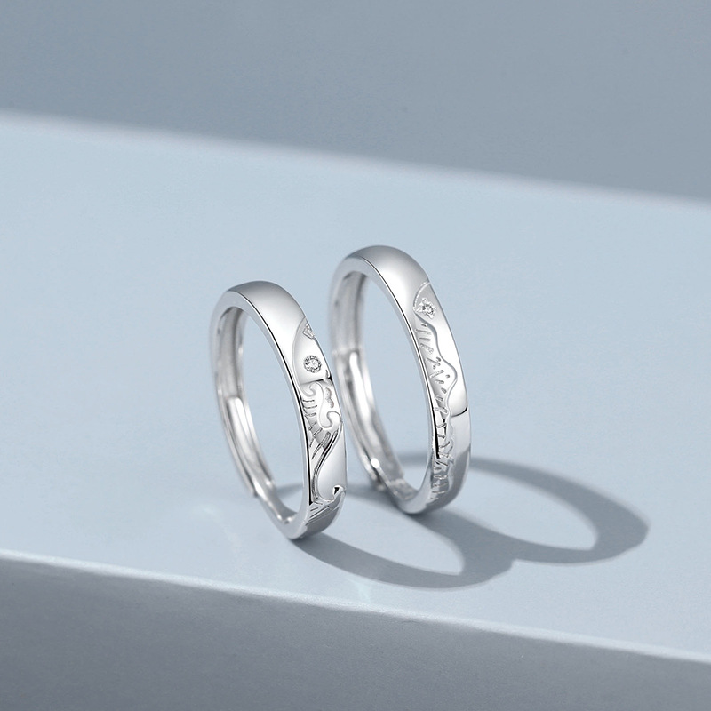 A Pair Of Sterling Silver Couple Rings