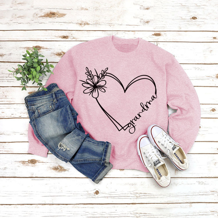 Pink sweater black font