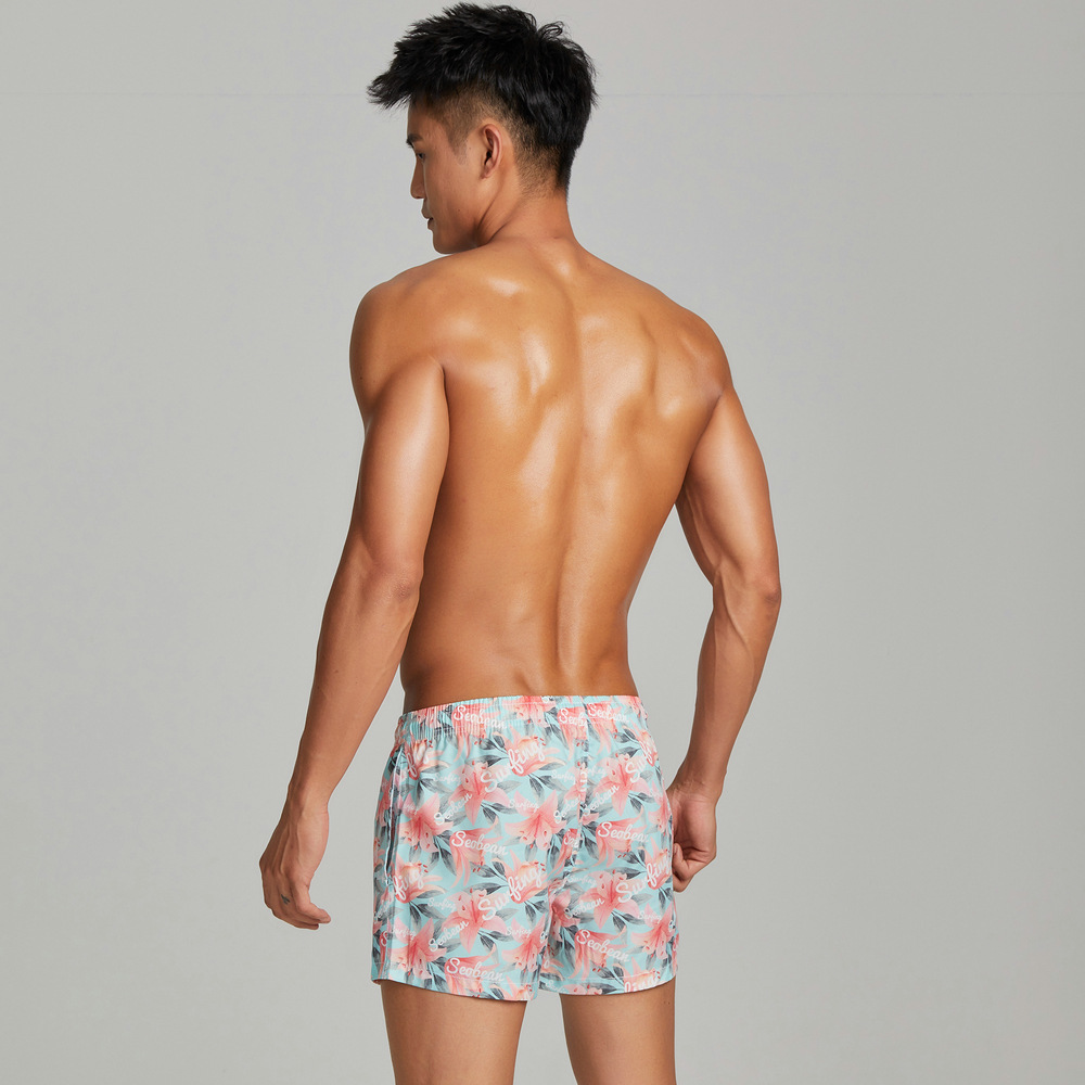 بنطال شاطئ رجالي بنقشة زهرة الليلي باهتة مع فرو خوخي أنيق