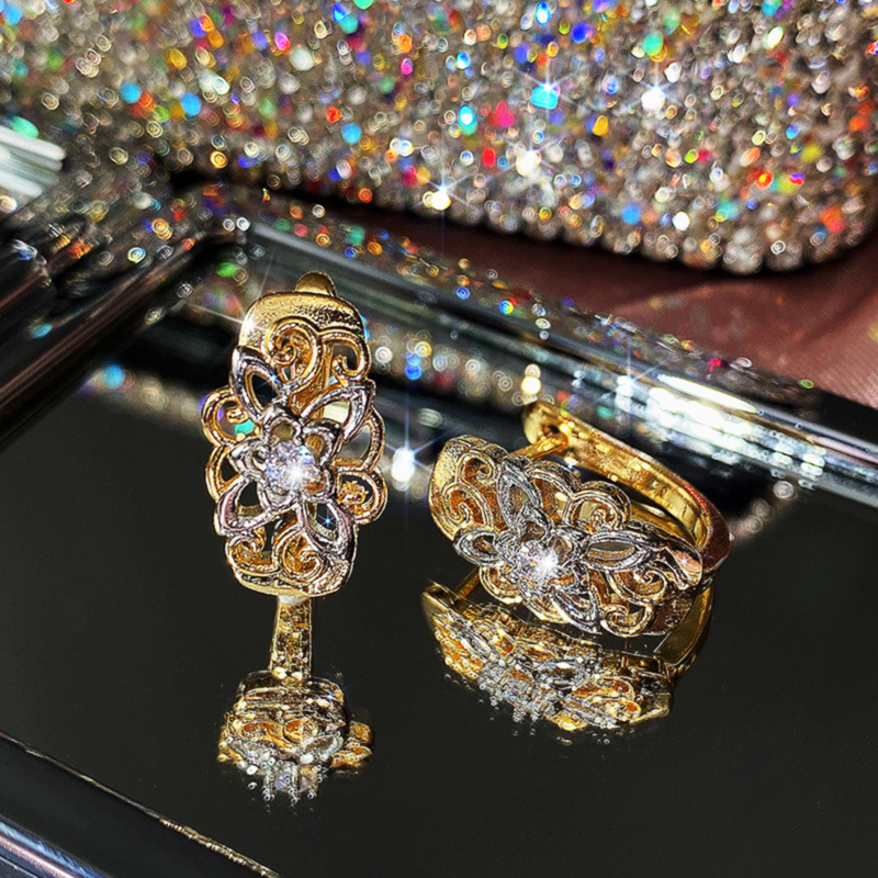 Exquisite Hollow Pattern Color Separation Ear Buckles