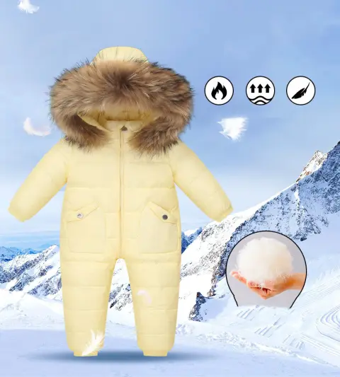 The Baby Wears White Eiderdown Over a Onesie