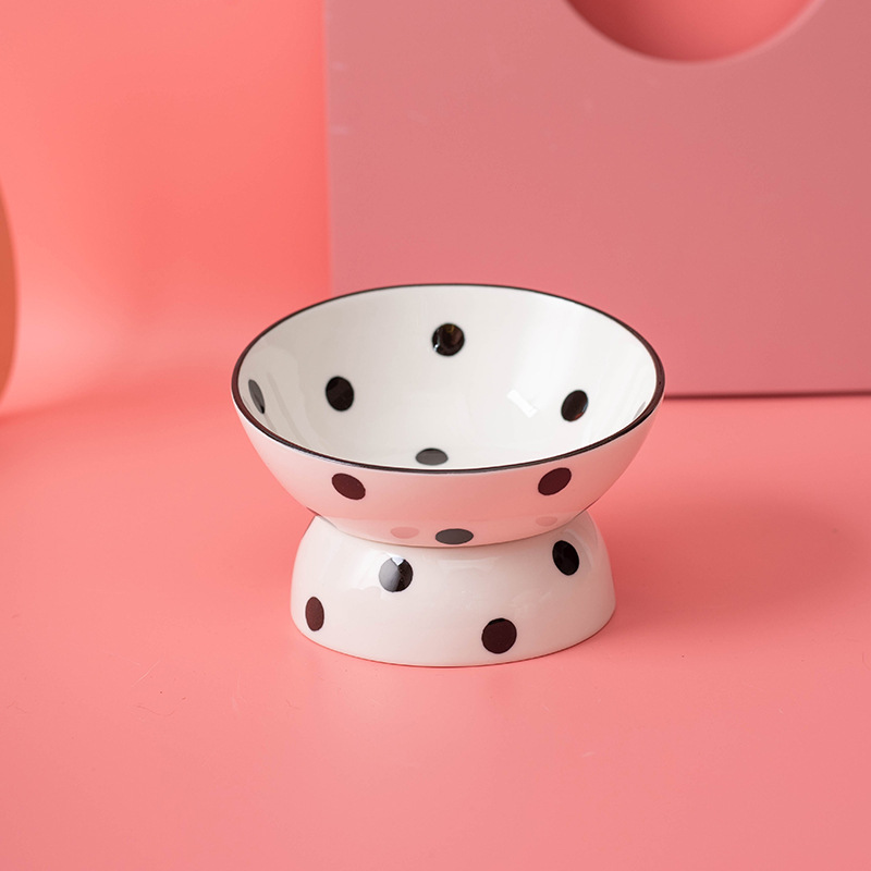 Polka dot black slant bowl