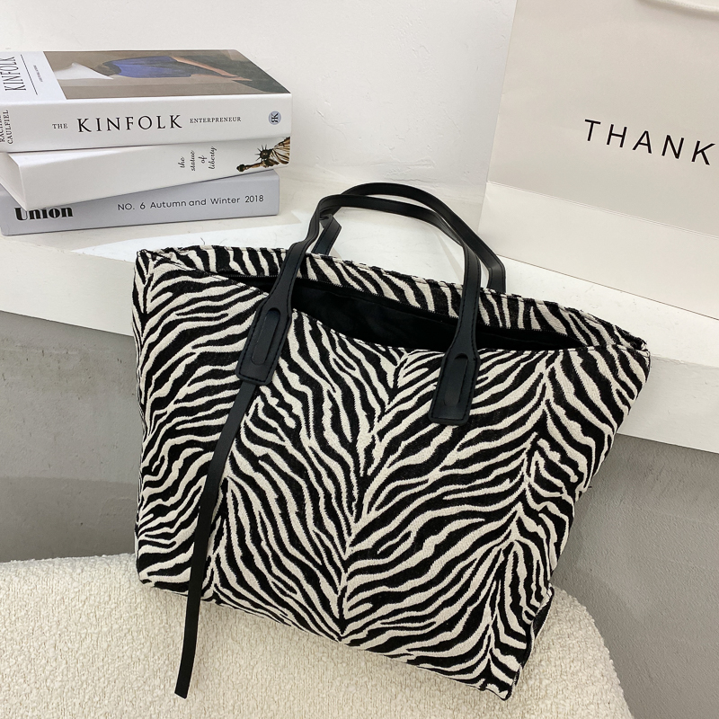 Title 3, Web celebrity zebra print tote bag