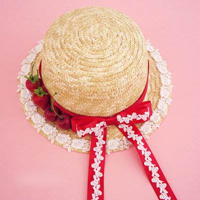 Straw hat with long streamers