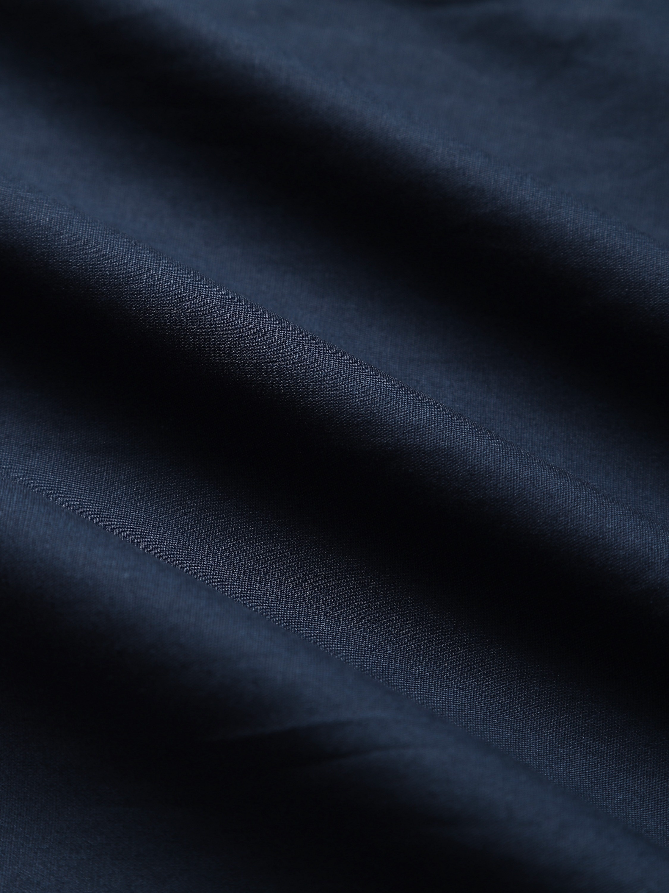 A Cool And Casual Long-sleeved Shirt In Contrasting Colors For A Teenage Man