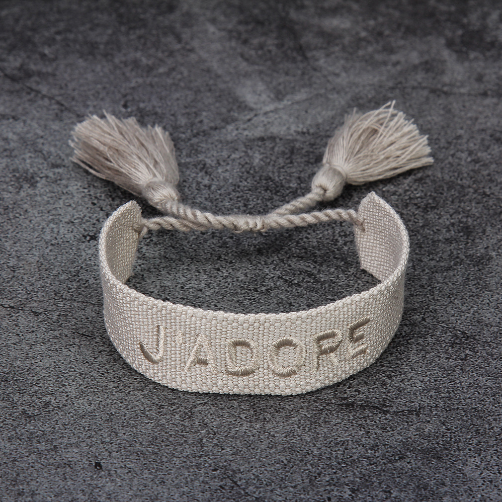 Title 9, French Alphabet Embroidered Bracelet J