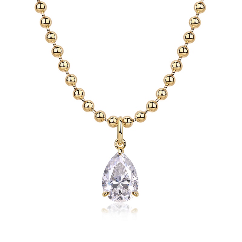 Gold-plated moissanite pendant necklace close-up showing gemstone brilliance