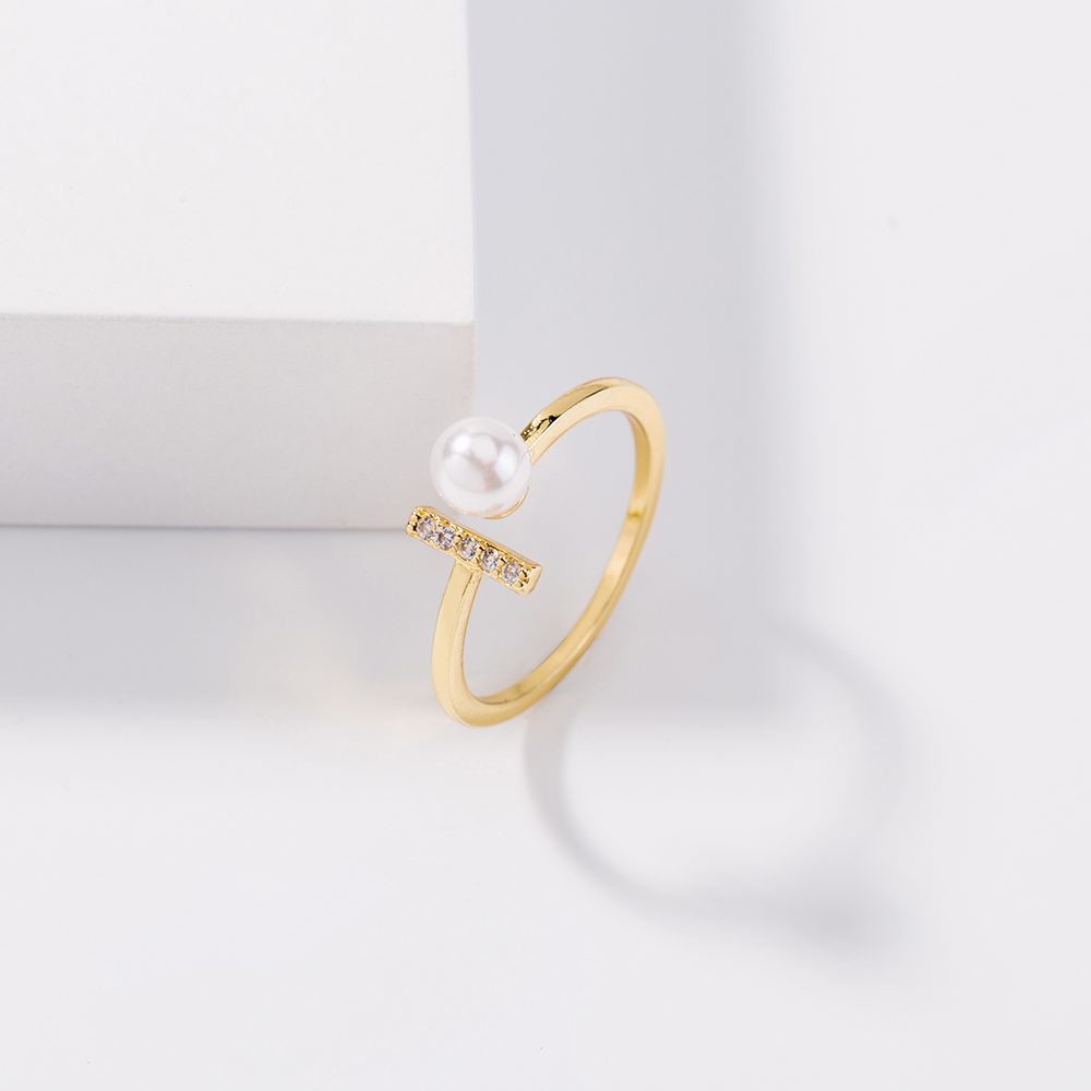 European and American fashion ins cold wind niche design gold simple T-shaped zircon pearl copper ring female