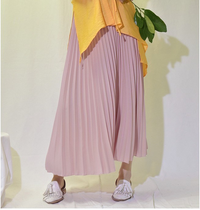 Title 6, Solid color pleated skirt offers effortless sty...