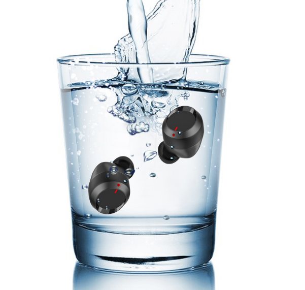 Wireless earbuds submerged in water emphasizing their water-resistant technology