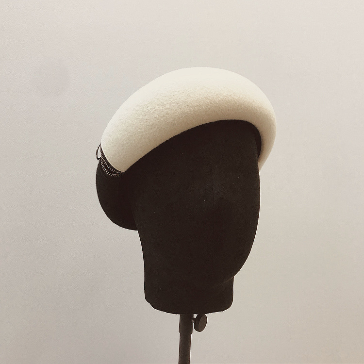 Title 6, Black and white wool felt hat with zipper and b...