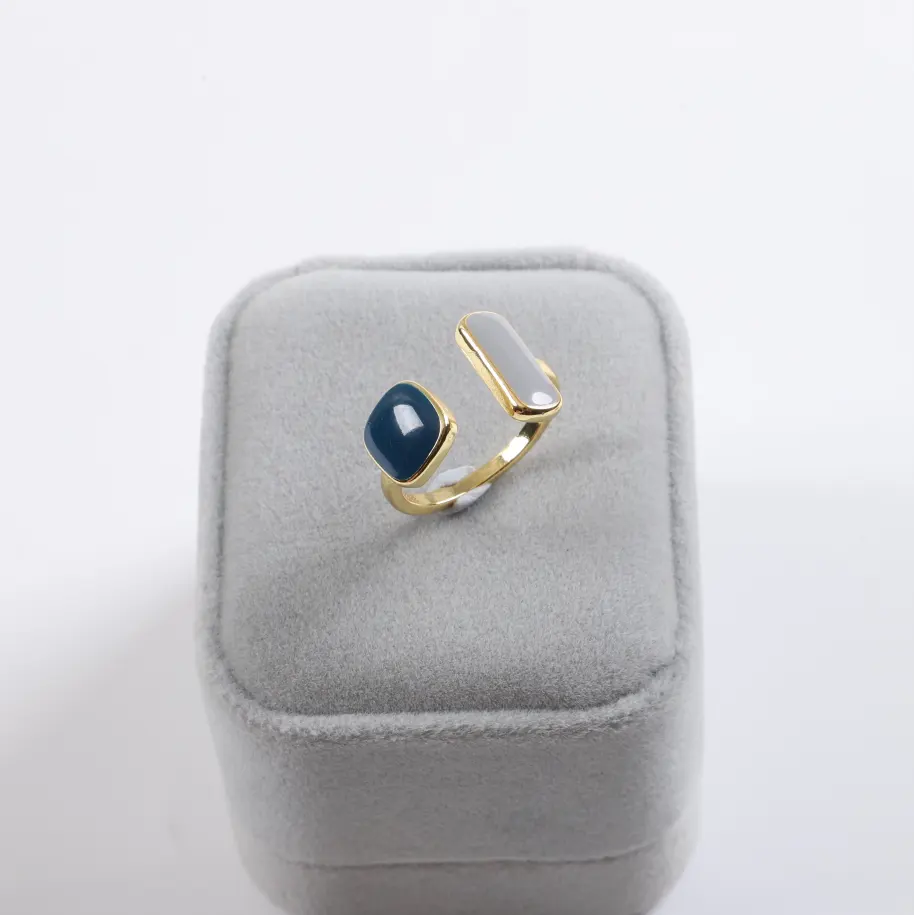 Elegant Women with Geometric Dripping Rings