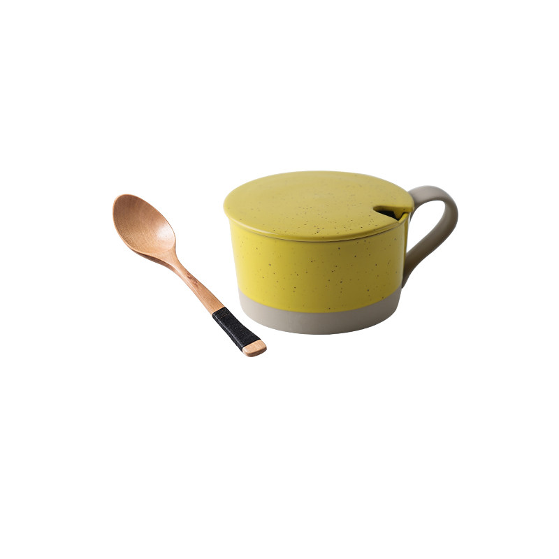 Yellow lid wooden spoon