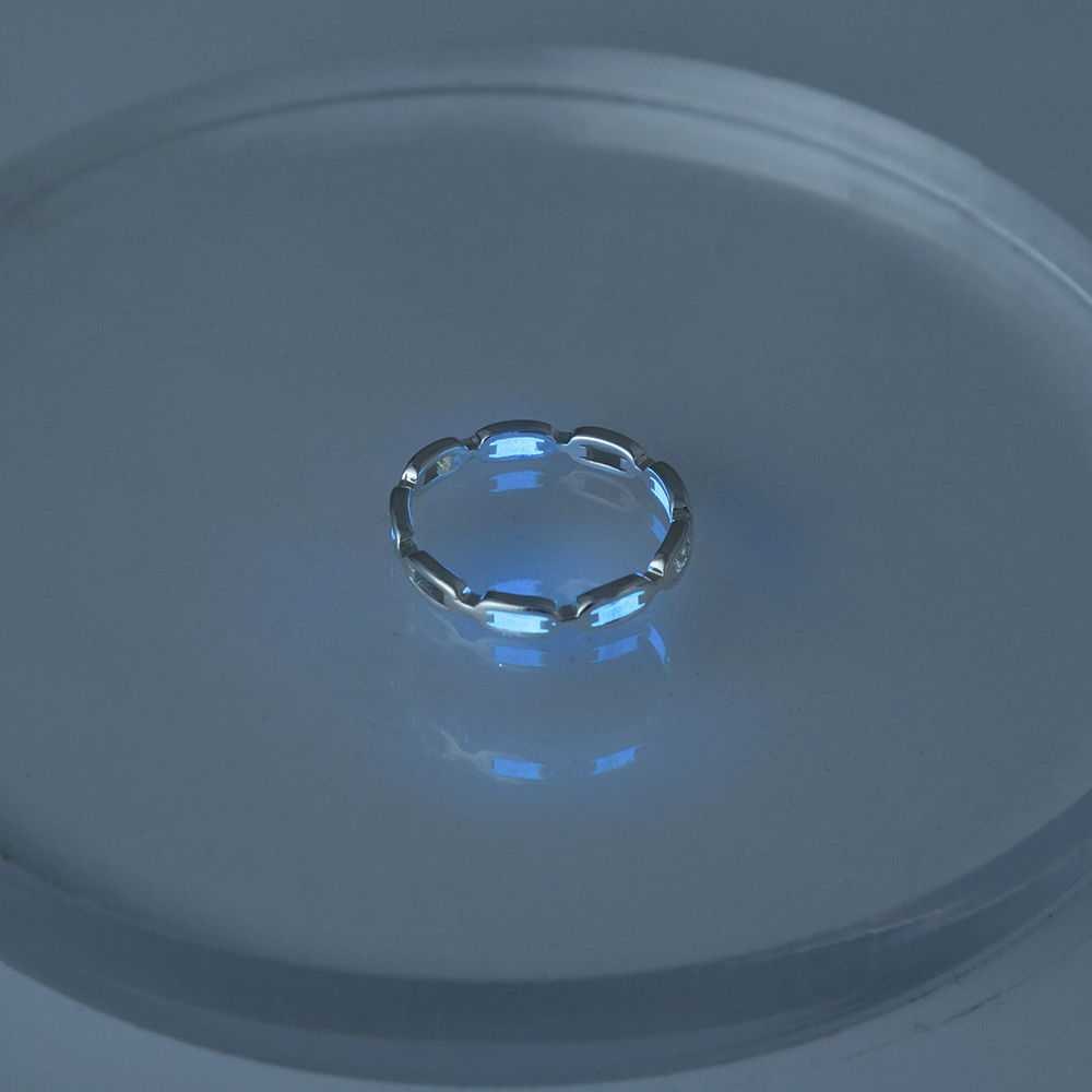 Glow-in-the-dark brass ring