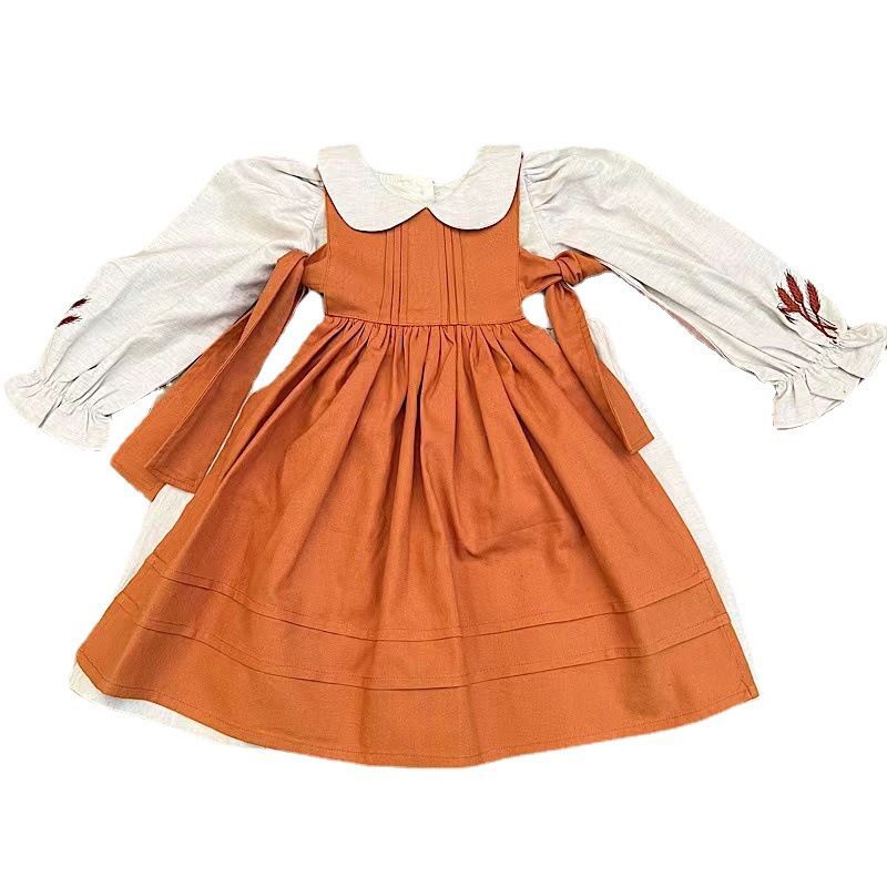 Orange suspender skirt