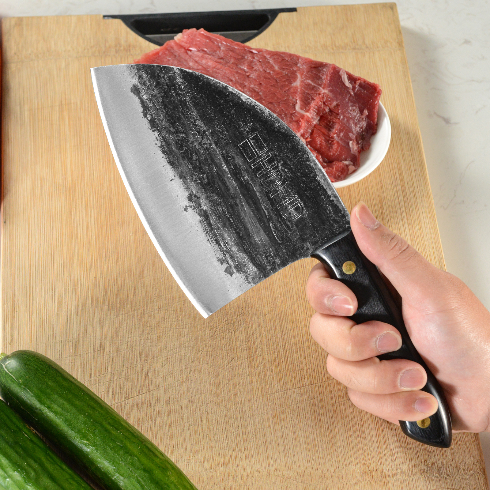 HDMD Meat Cleaver Knife - High Carbon Steel. High Quality Meat Cleaver This kitchen cleaver knife is real hand forged and made of high carbon steel, it's blade uses a V-shaped and fine processing blade, high hardness and wear resistant. Hand polished edge