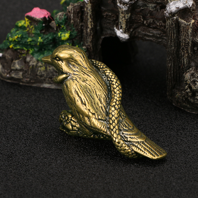 Title 6, Fierce Snake Wrapped Bird Brass Ornaments