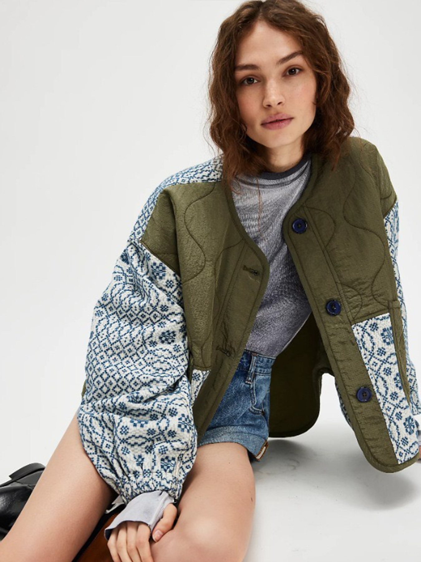 Women's quilted printed patchwork coat styled for autumn — full outfit