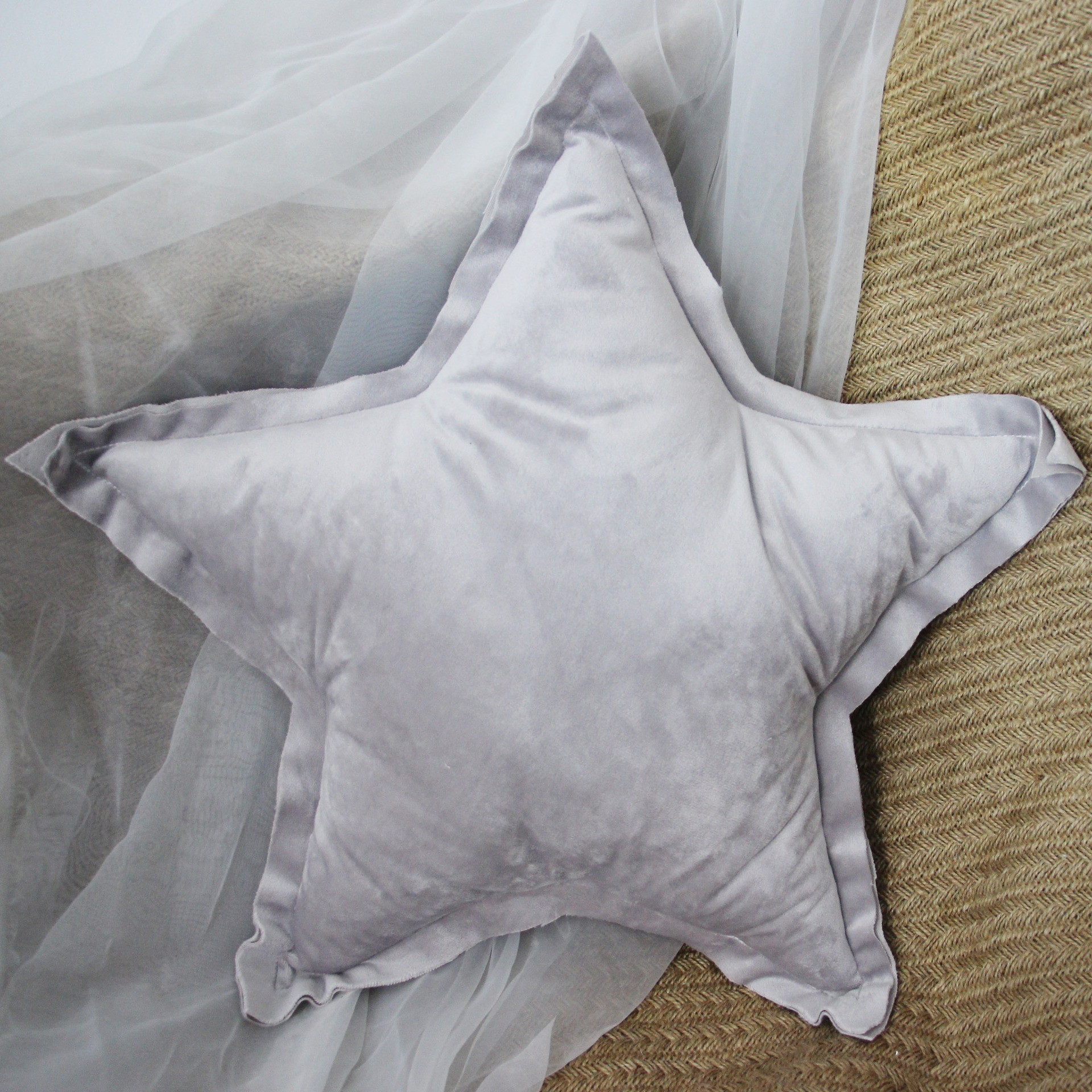 Warm grey star pillow