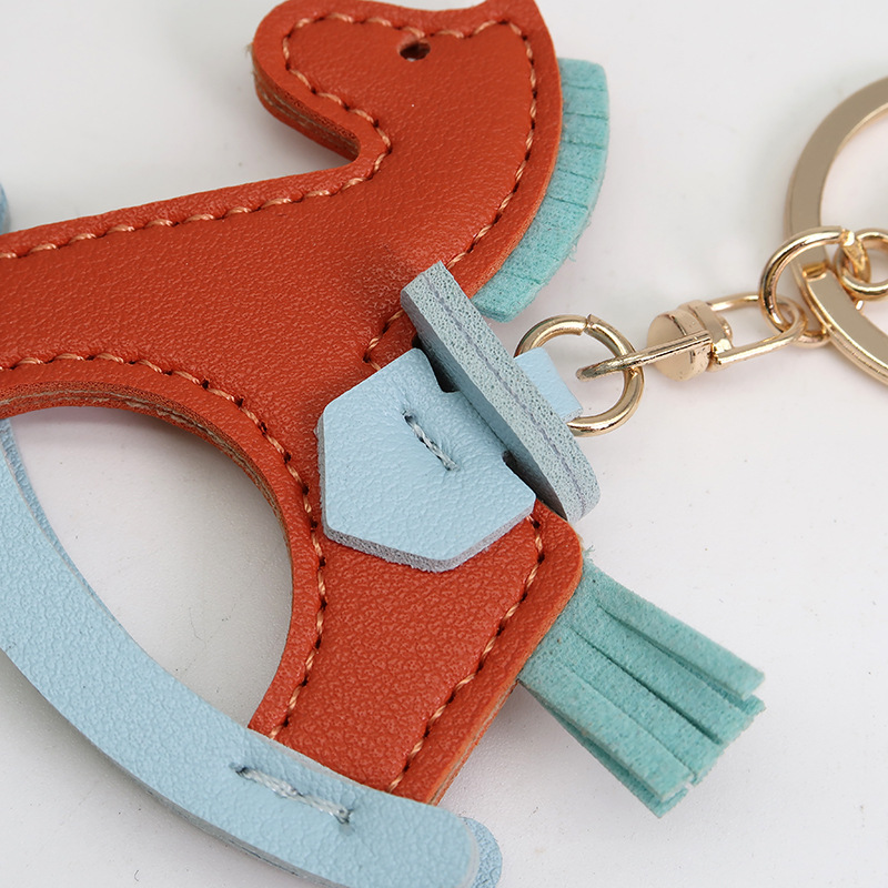 Title 3, Leather Shake Small Wooden Horse Key Chain