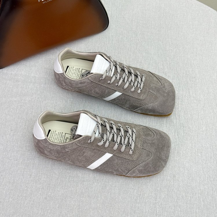 Women's chunky platform sneakers styled with casual outfit – street style look