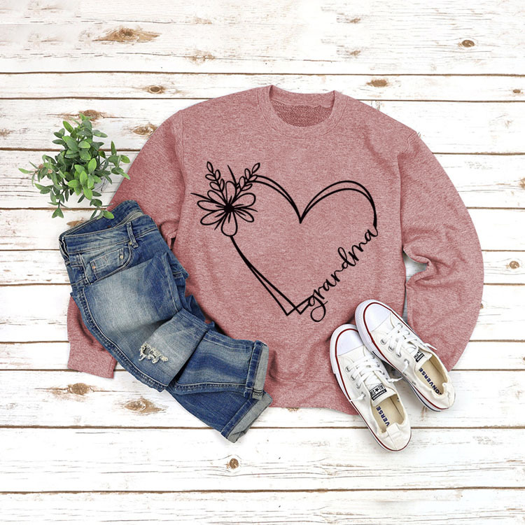 Rose gold sweater black font