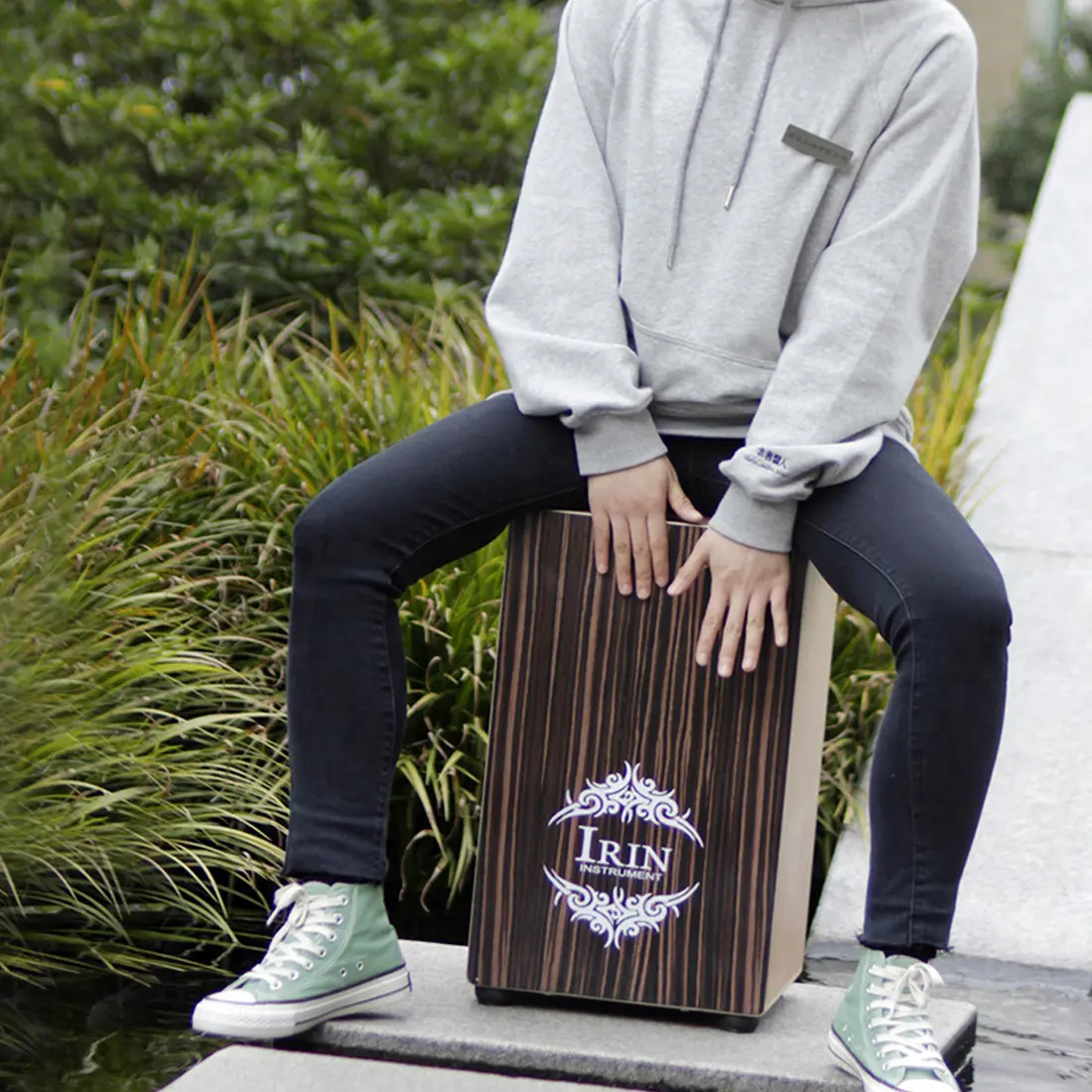 Box Drum Played By Sitting On