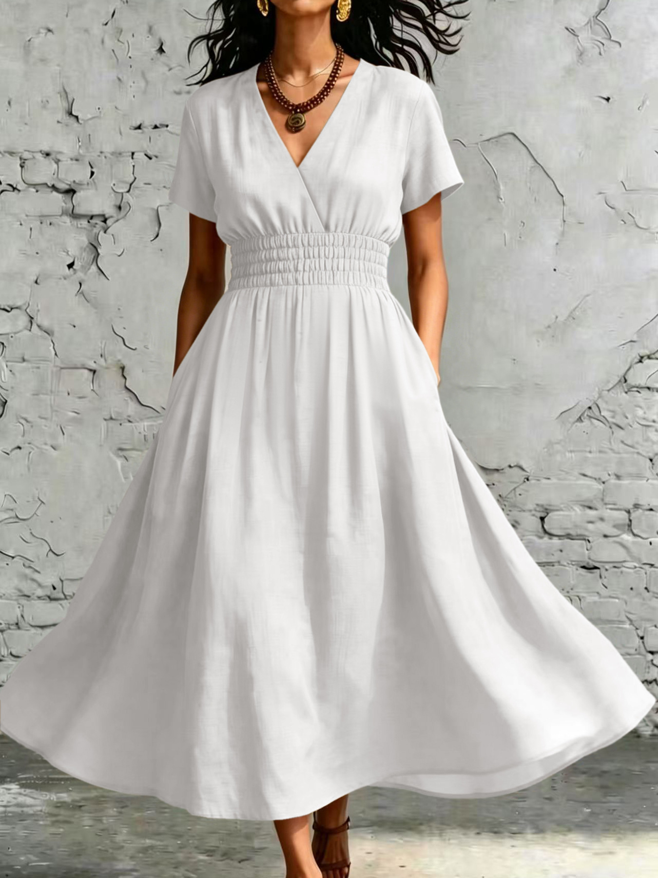 Women's V-neck midi dress with flared sleeves styled for casual summer outfit