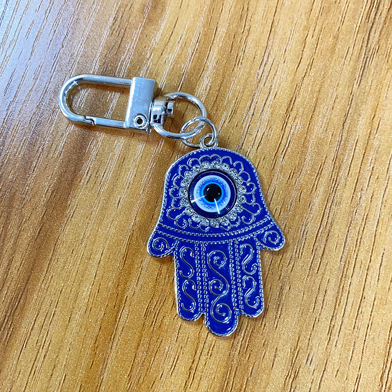 سلسلة مفاتيح بتعليق قطرة زيت عتيقة