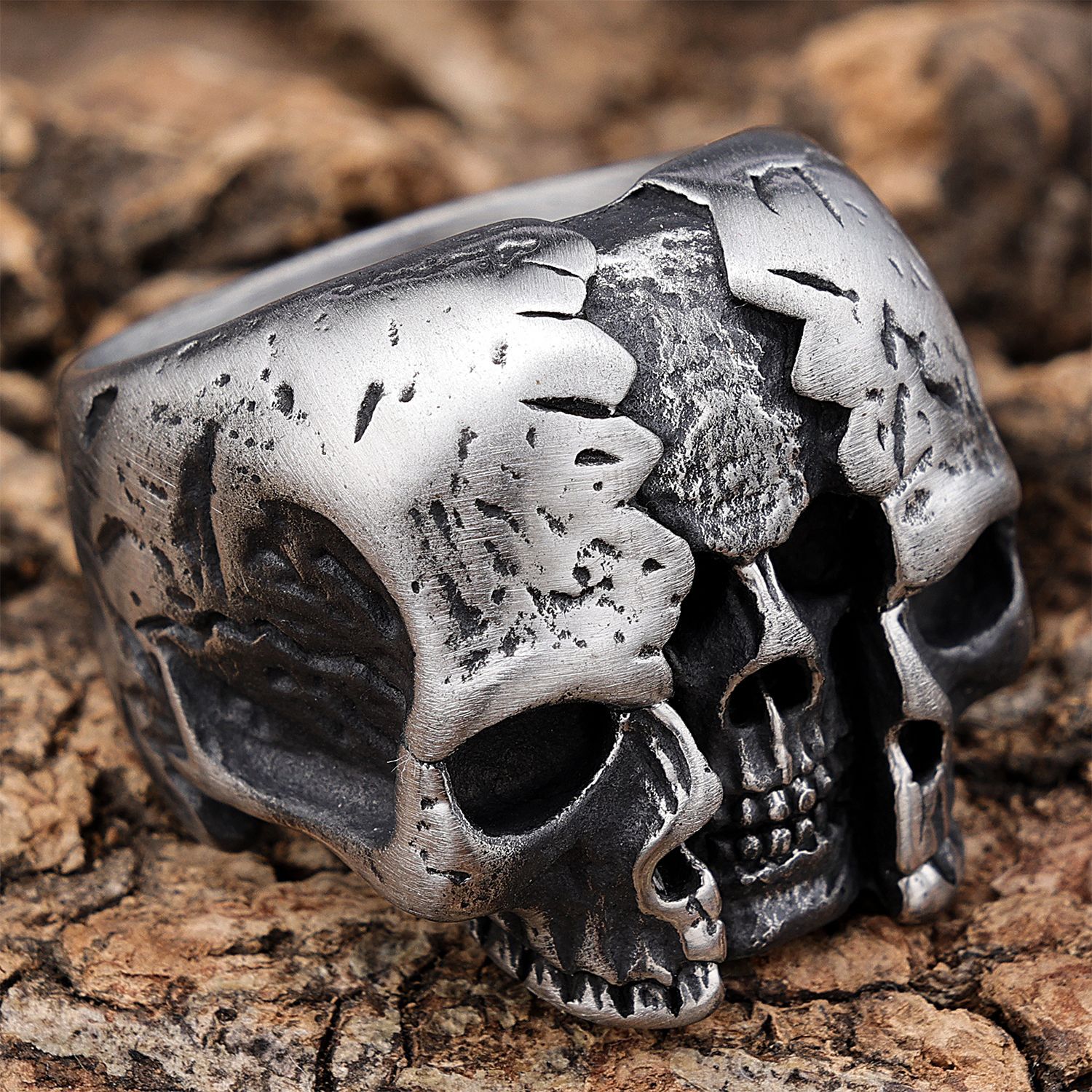 Bague rétro triple crâne en acier
