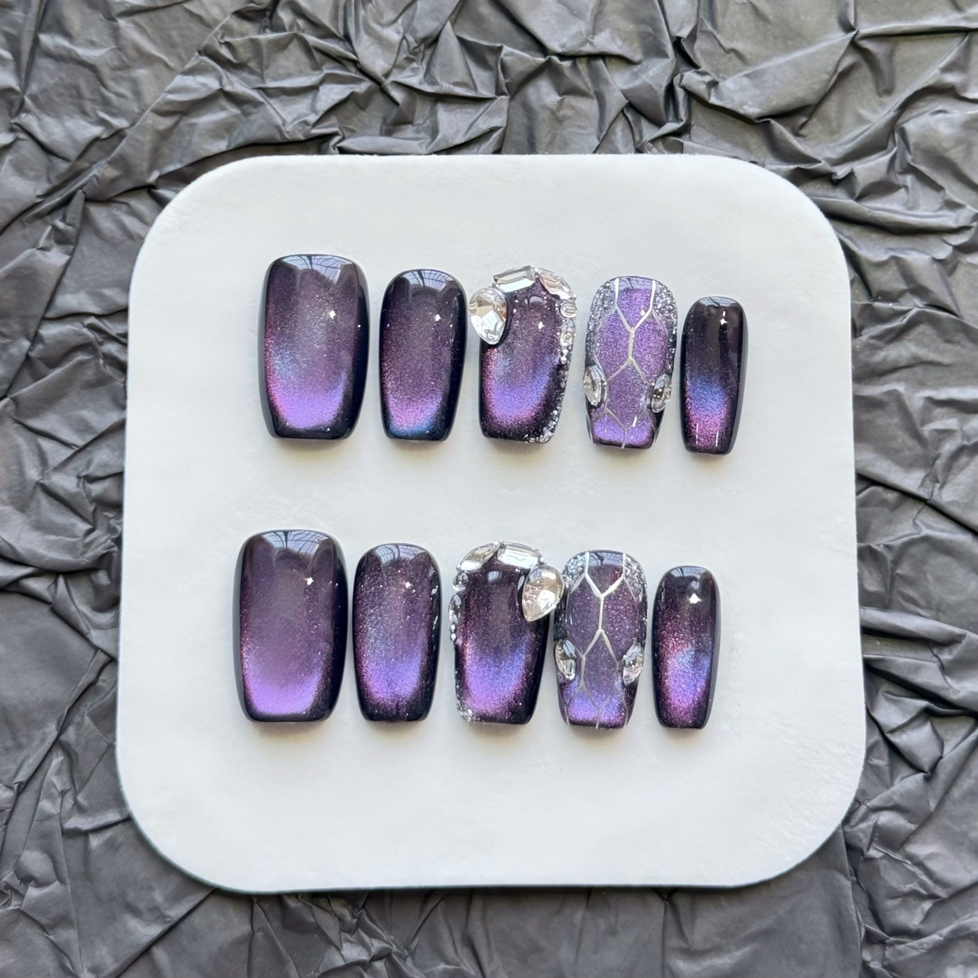Elegant Purple Cat-Eye Nail Art