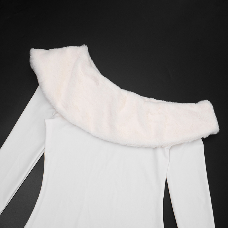 long sleeve white maxi dress showing slim pencil skirt fit and clean hem, elegant staircase background with holiday decor
