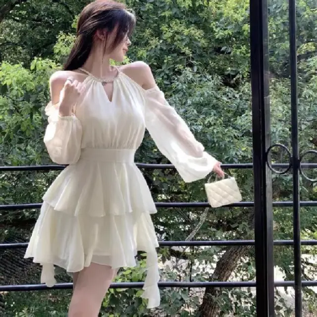 Apricotcolored Longsleeved Dress With A Cinched Waist Slimming Effect And Ethereal Ruffled Hem Apricot - Shop at LoveMi