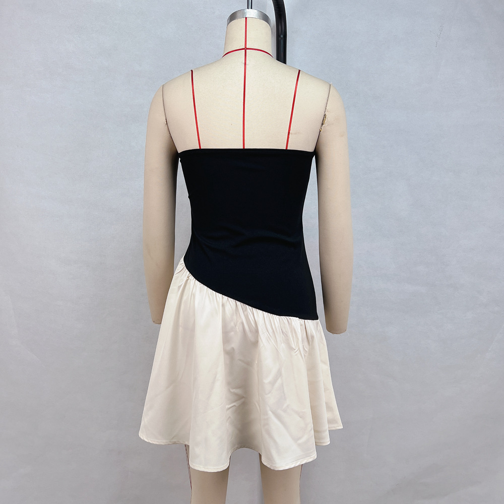 Women's pleated color block tube top dress in black, back view showing strapless silhouette