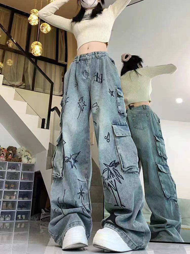 Title 2, Jeans donna larghi con graffiti di cartoni anim...