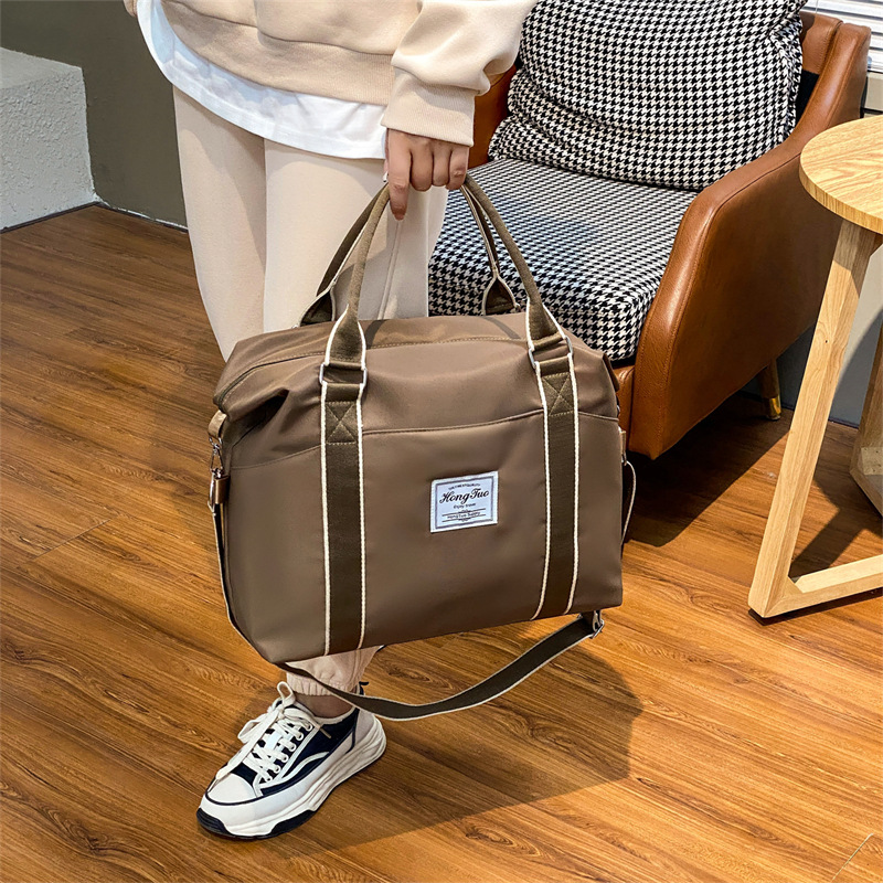 حقيبة سفر محمولة نسائية بسعة كبيرة خفيفة الوزن ومضادة للماء