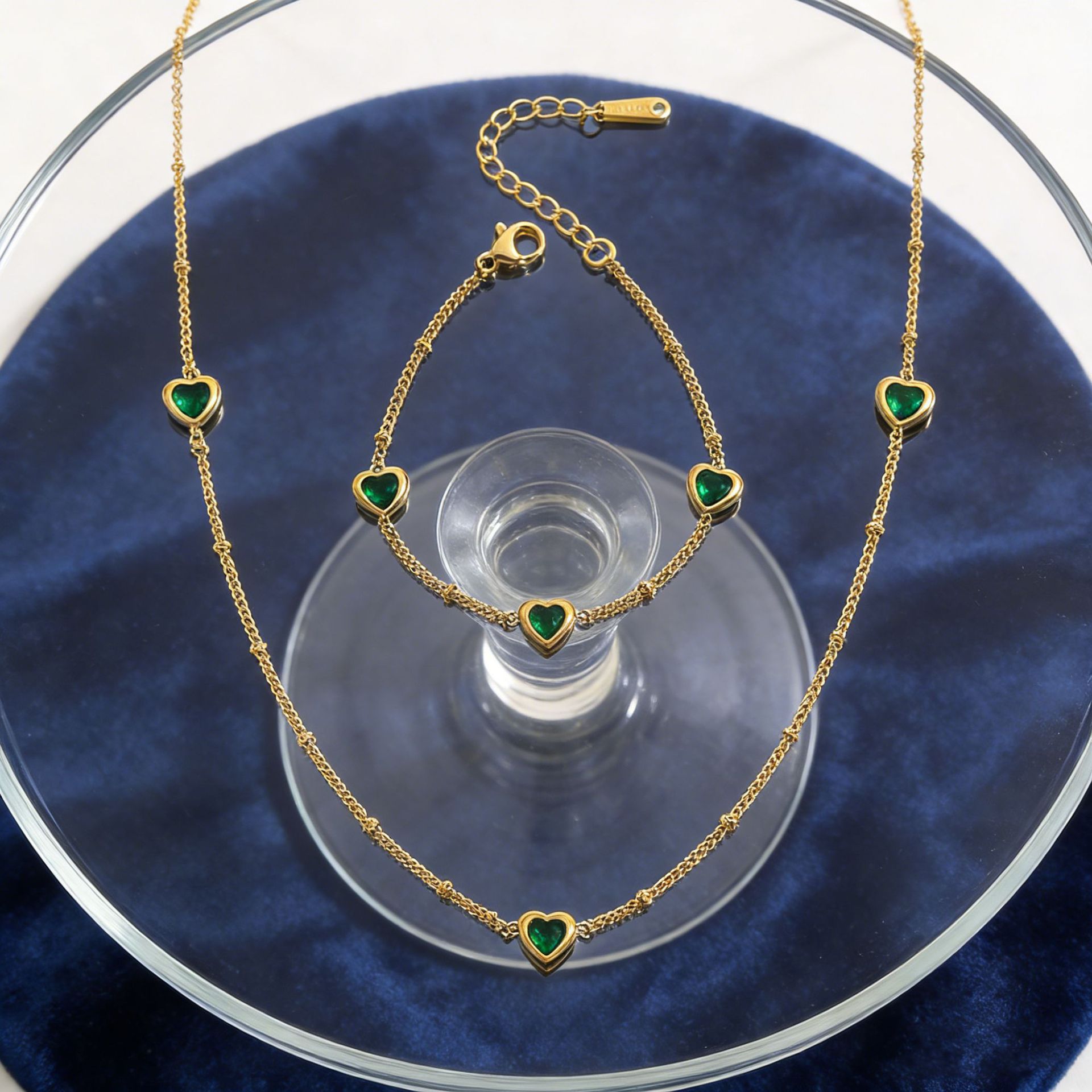 Stainless Steel Necklace And Bracelet With Inlaid Green Diamond Hearts