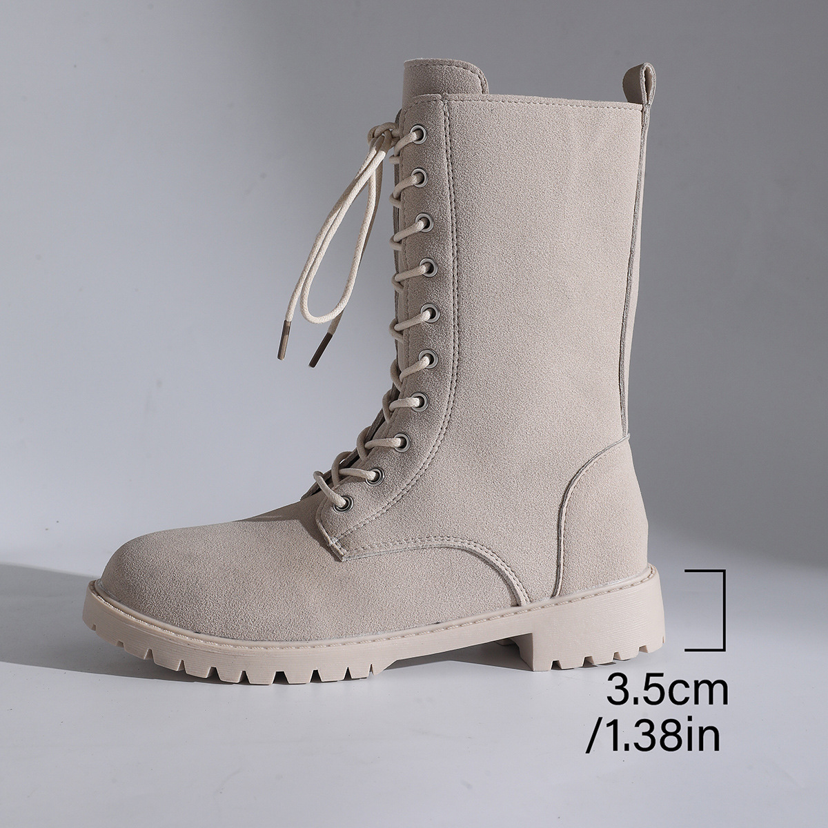 Women's lace-up mid-calf combat boots – shaft height and silhouette detail