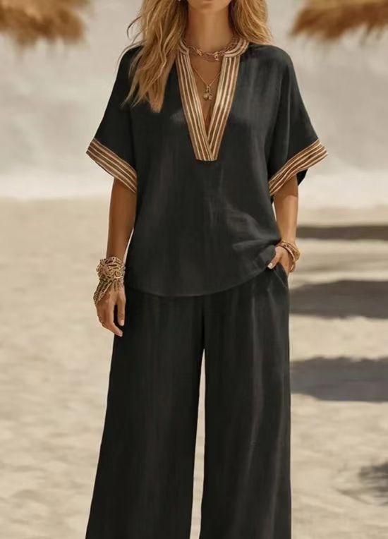 Women's linen sleeveless cardigan and wide-leg pants set in Black – co-ord styled for casual day out with sneakers