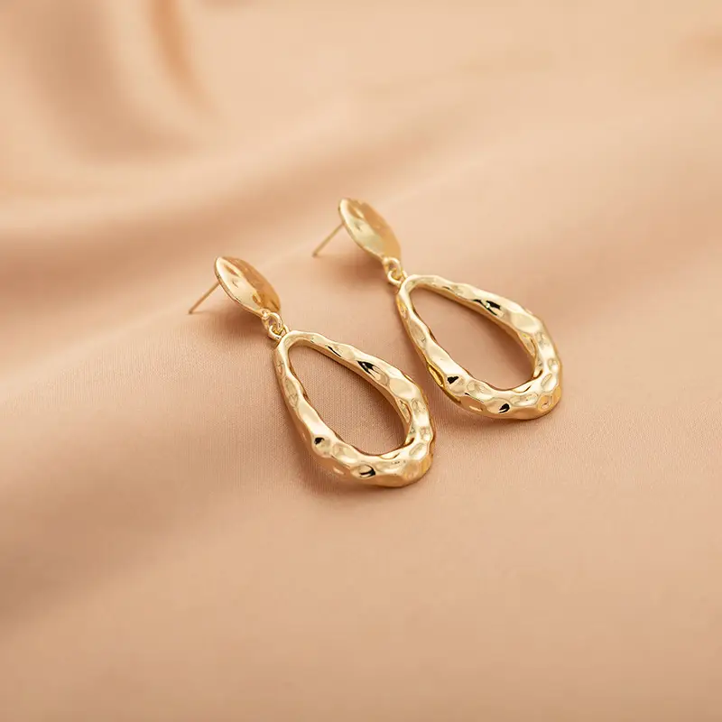 Hollow Waterdrop Pendant Gold Earrings Fashionable Style