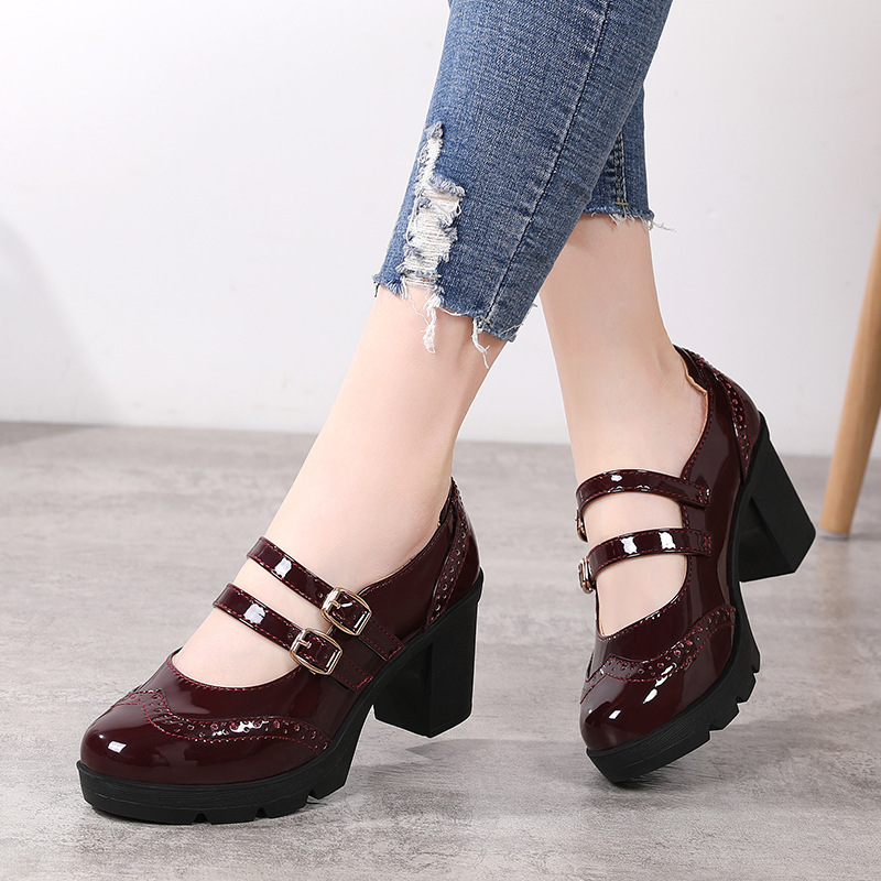 Chunky-heeled Patent Leather Wedge Sandals With A Strap-and-buckle Closure