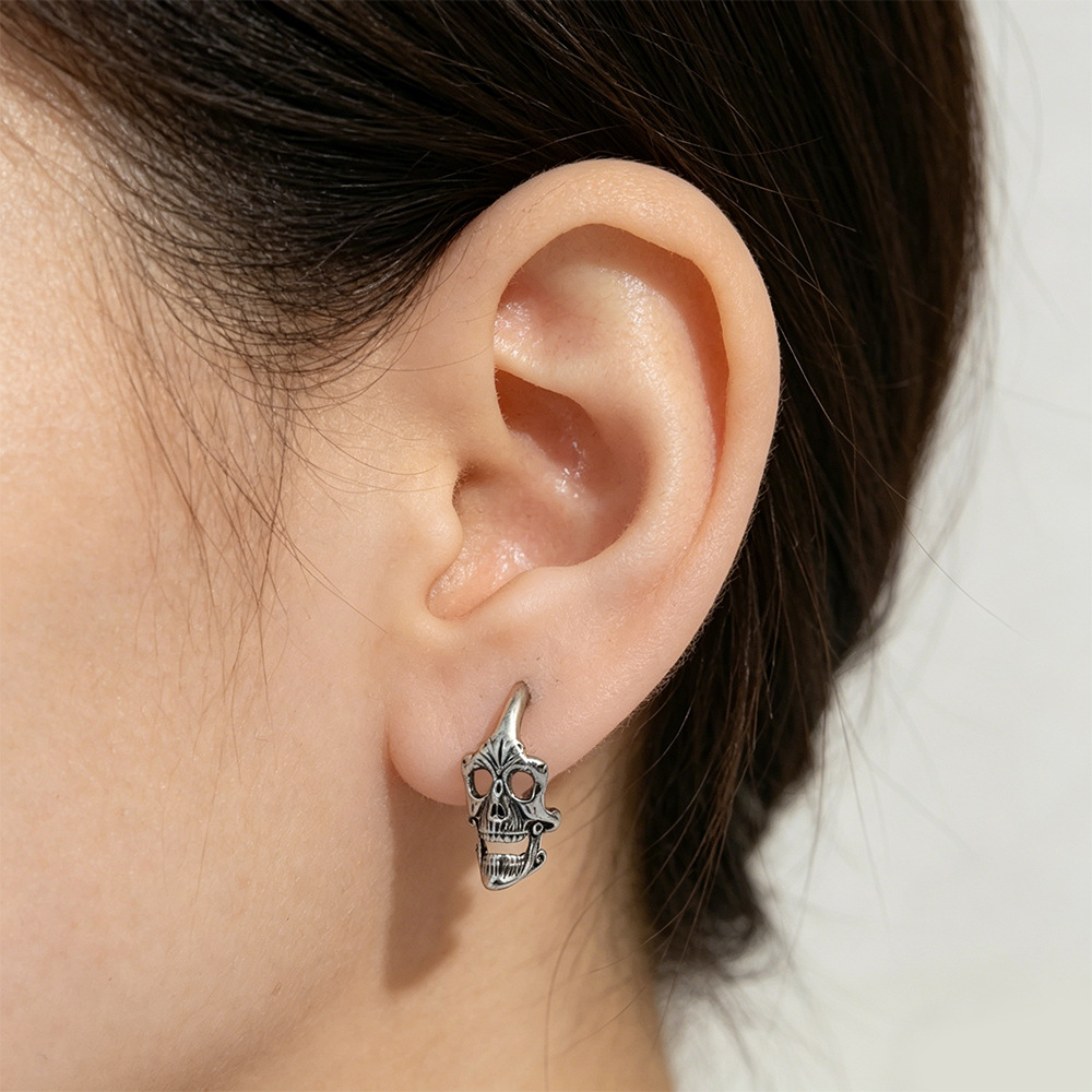Dark Hollowed-out Skull Hoop Earrings