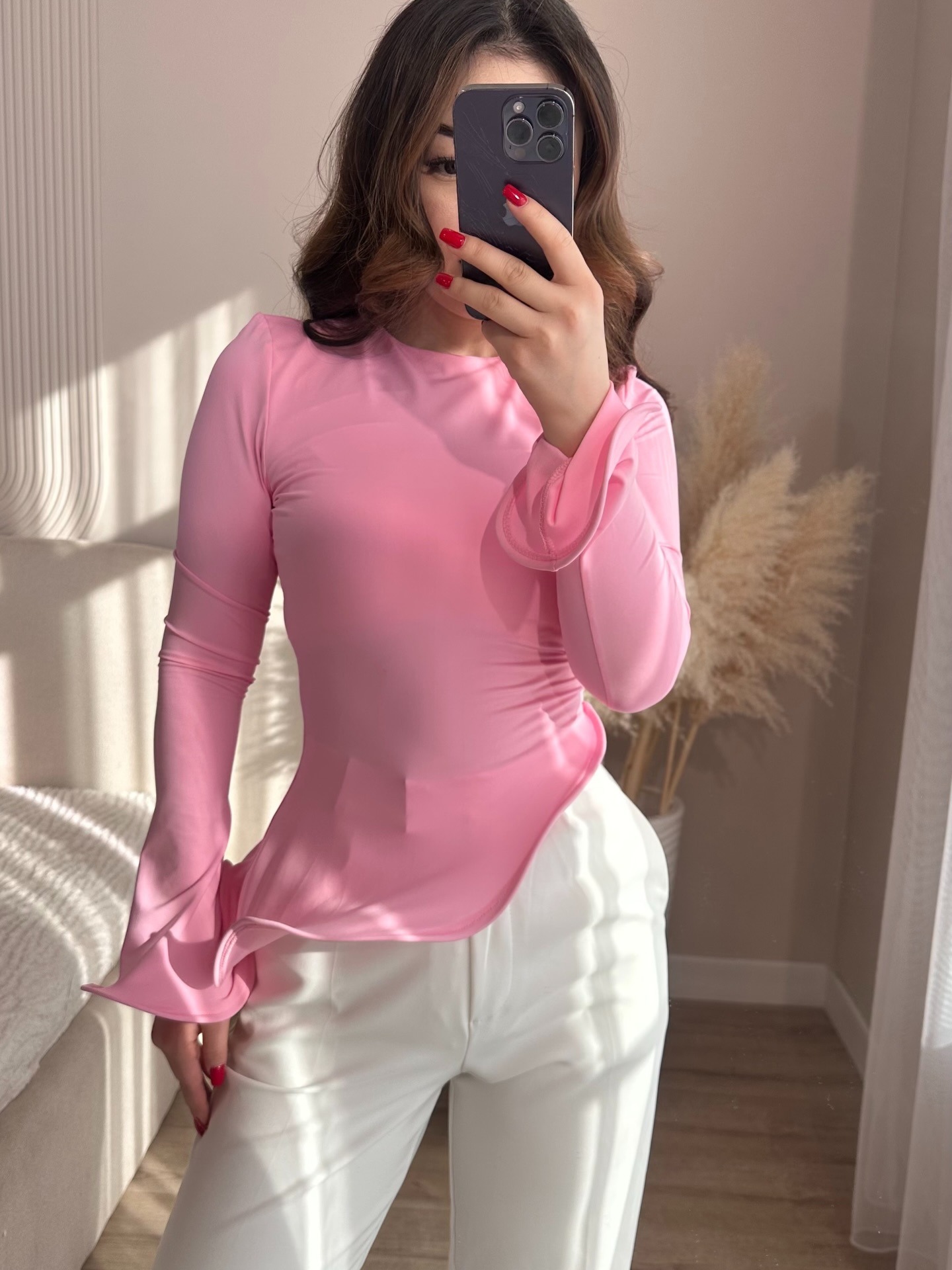 Crew-neck T-shirt With A Solid Color And An Asymmetrical Ruffled Hem