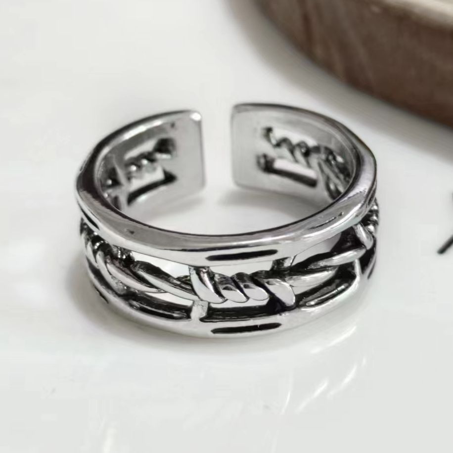Fashion Retro Distressed Hollow Twist Ring Men