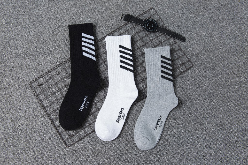 Title 2, Striped sports socks for enhanced performance a...