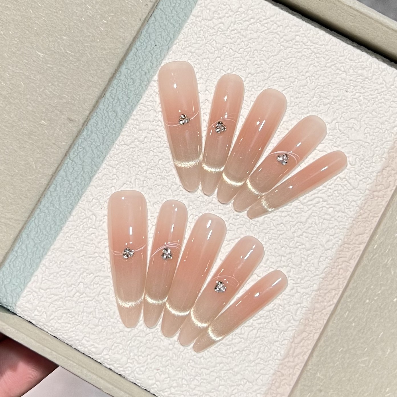 Slender Elegant Fingers Adorn A Pure