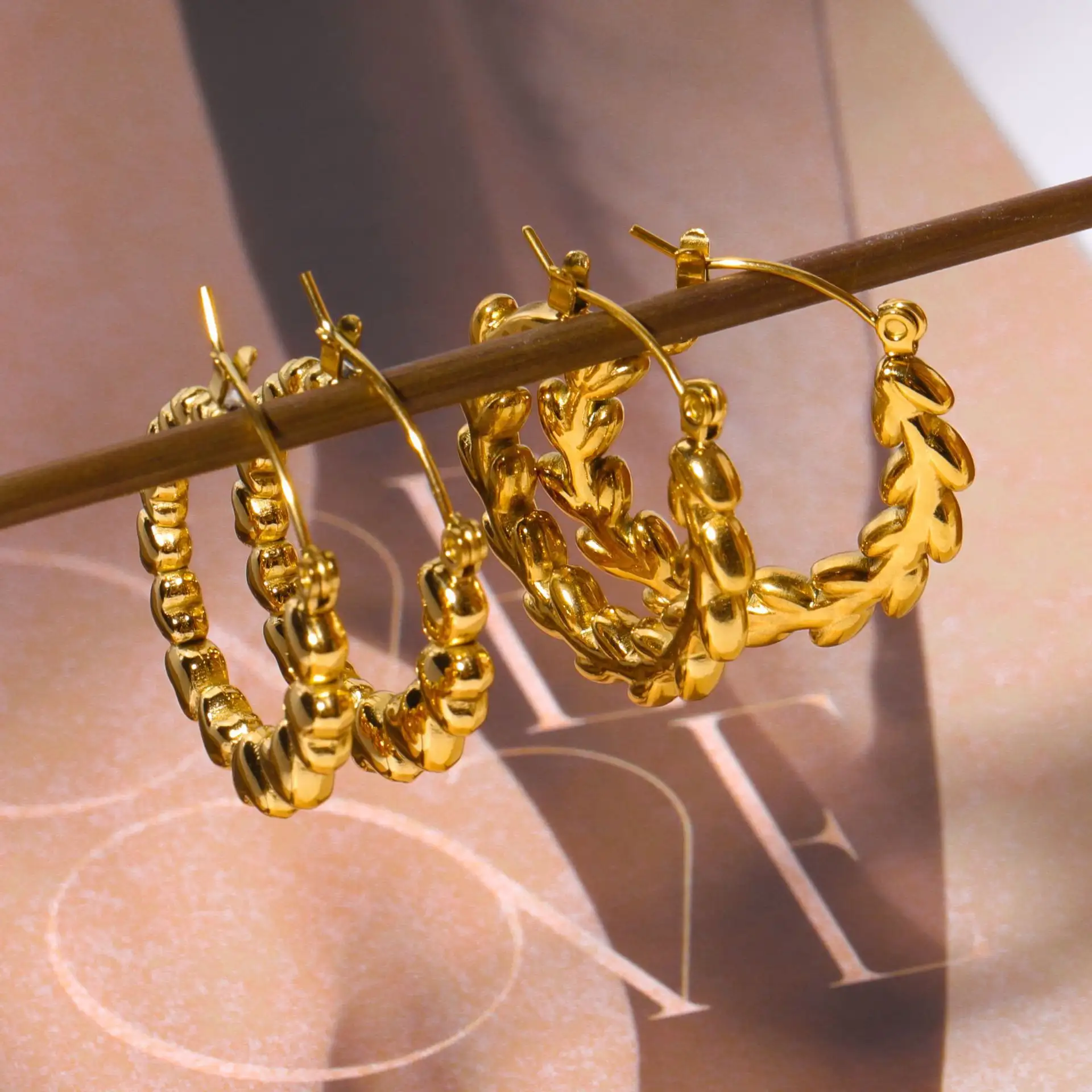 Electroplated Titanium Steel Cold Diabolo Earrings