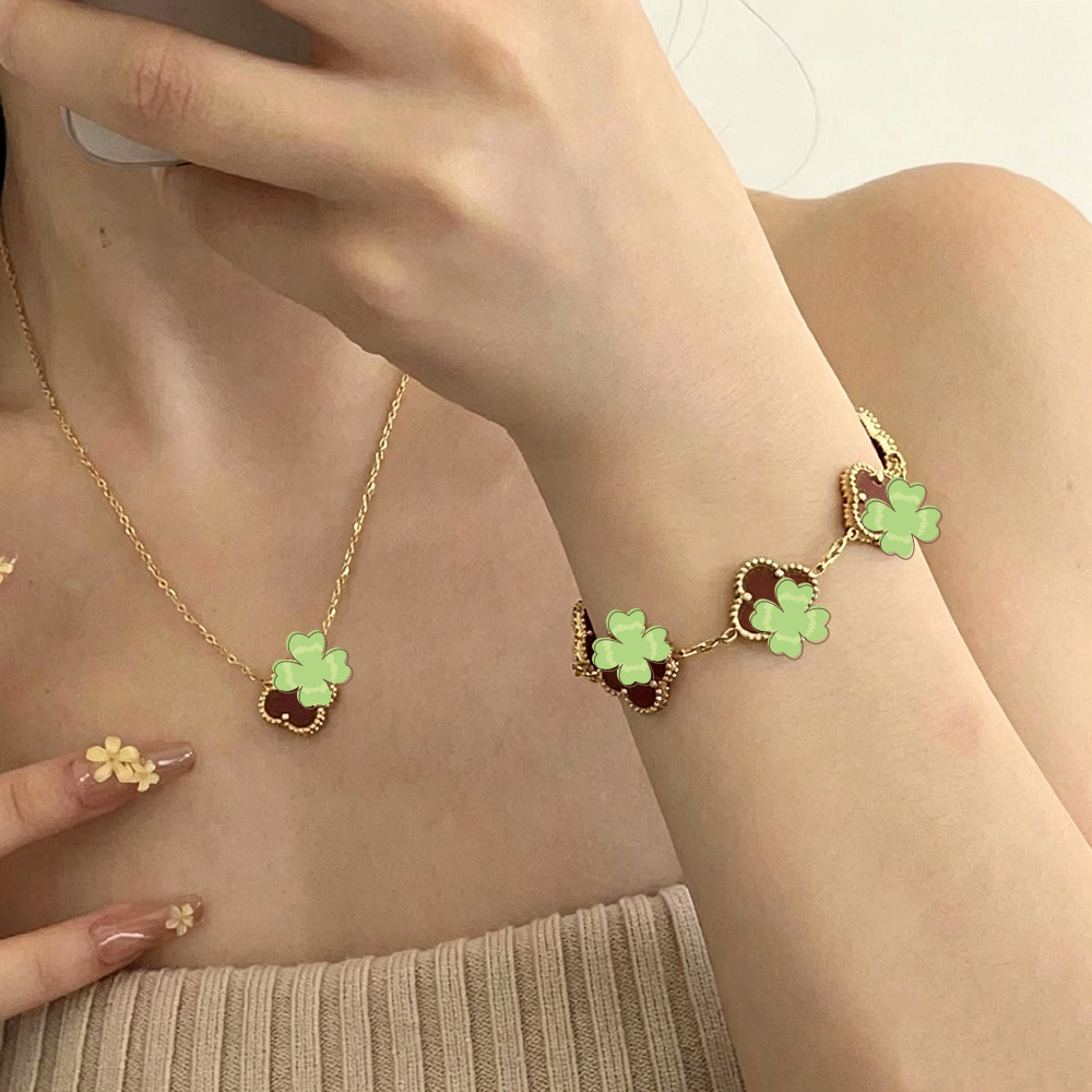 Titanium Steel Shell Double-sided Necklace And Bracelet Clover Pendant Set product image