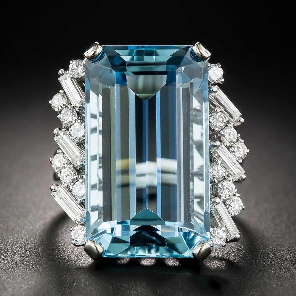 خاتم خطوبة فاخر بتوباز ومرصع بأحجار الياقوت الأوروبية والأمريكية